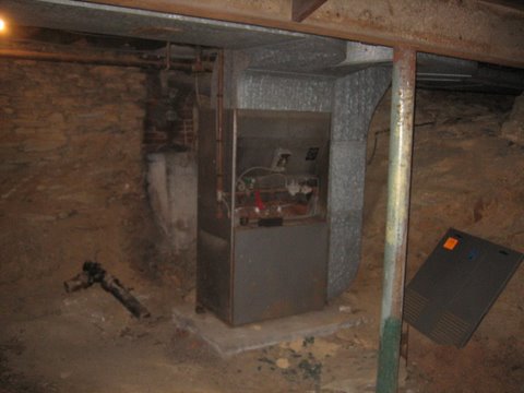 50 Basement under auditorium - cleaned out!  The furnace is being replaced.JPG - 33881 Bytes